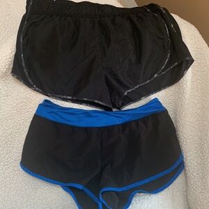 Black with grey trim swirl and black with royal blue size xl SO brand 2 pair